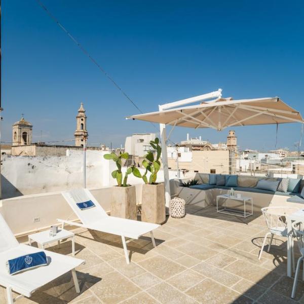 a chair sitting in front of a building