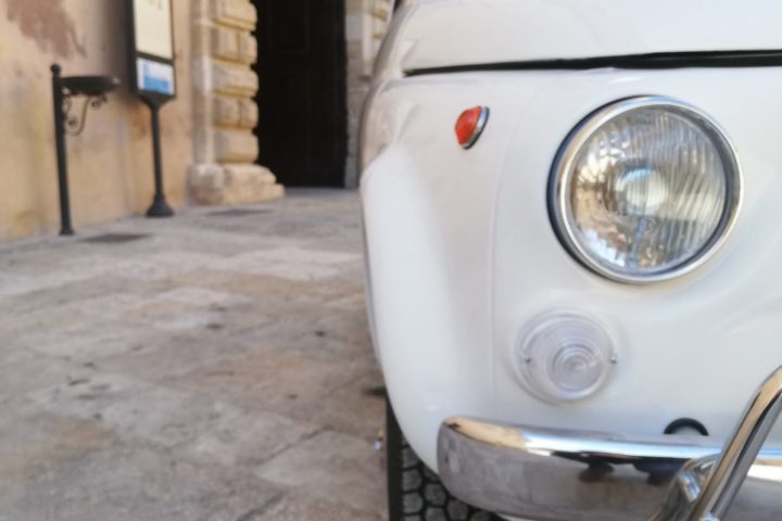 a car parked on the side of a building