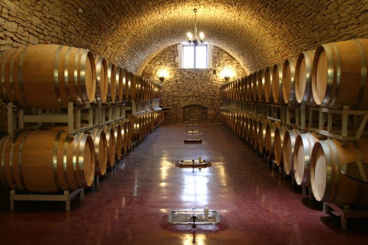 a barrel on a wooden floor