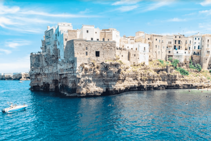 a castle surrounded by a body of water